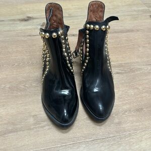 Flat studded ankle boots